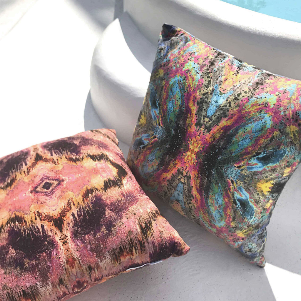 Award winning Sonya Rothwell luxury cushions + outdoor cushions in breathable waterproof fabric, beautifully handmade to order in four sizes by local artisans. Art inspired ikat style celestial designer pillow in a vibrant multi coloured textile pattern luxe sagedesign to suit modern home decoration and garden furniture